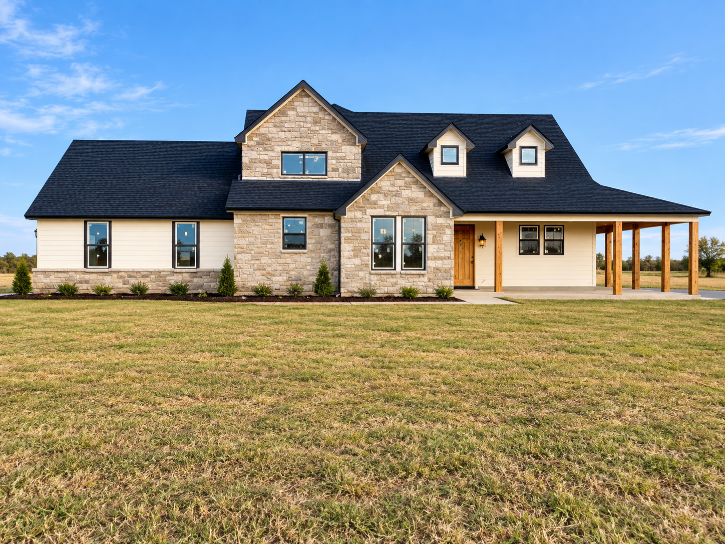Custom Texas farmhouse built by Jasper Homes at sunset