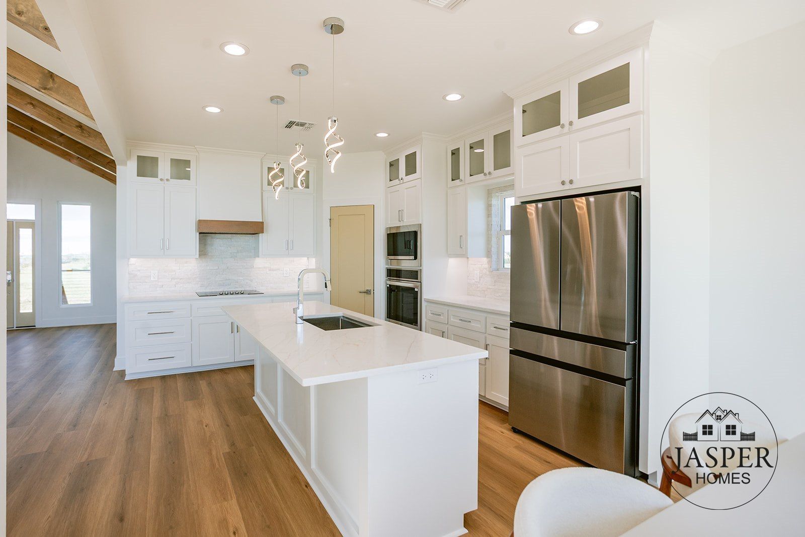 Palacios custom home on Windswept Drive by Jasper Homes — photo 40